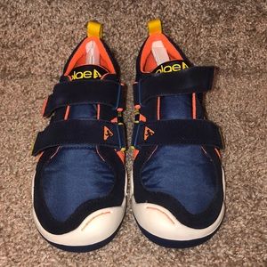 Brand new and never worn Plae shoes